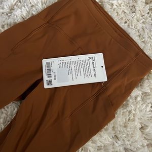 Women’s/Girls Lululemon caramel colored leggings. Size 0.